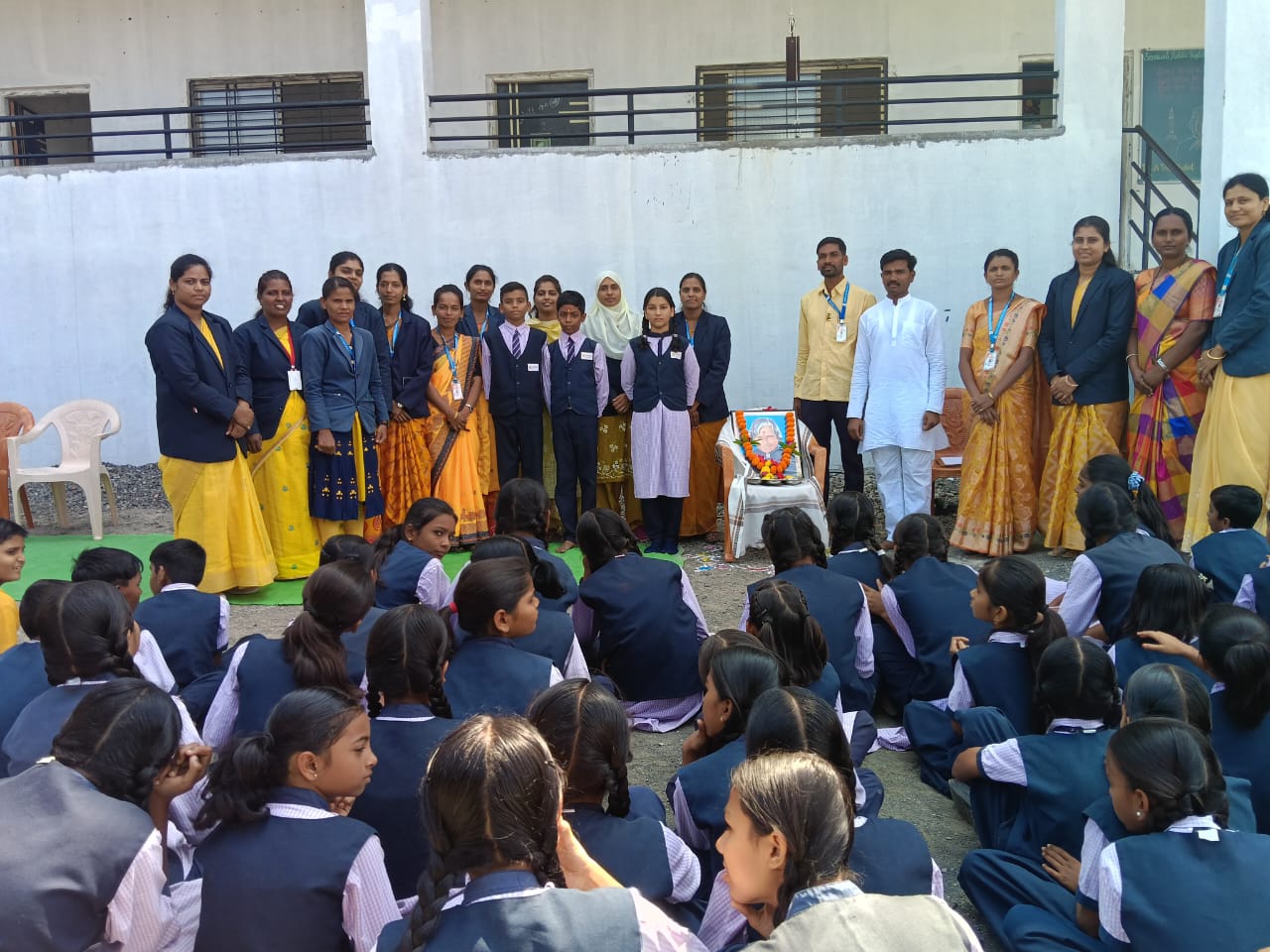 Students and teachers celebrating together at school